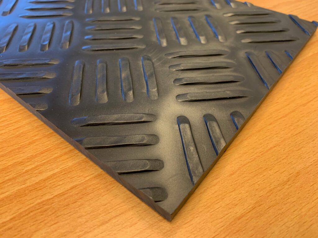 Plastic sheet for under a pig’s feeding trough